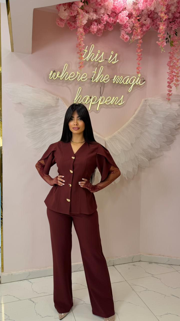 A sculpted peplum blazer set with lace sleeves