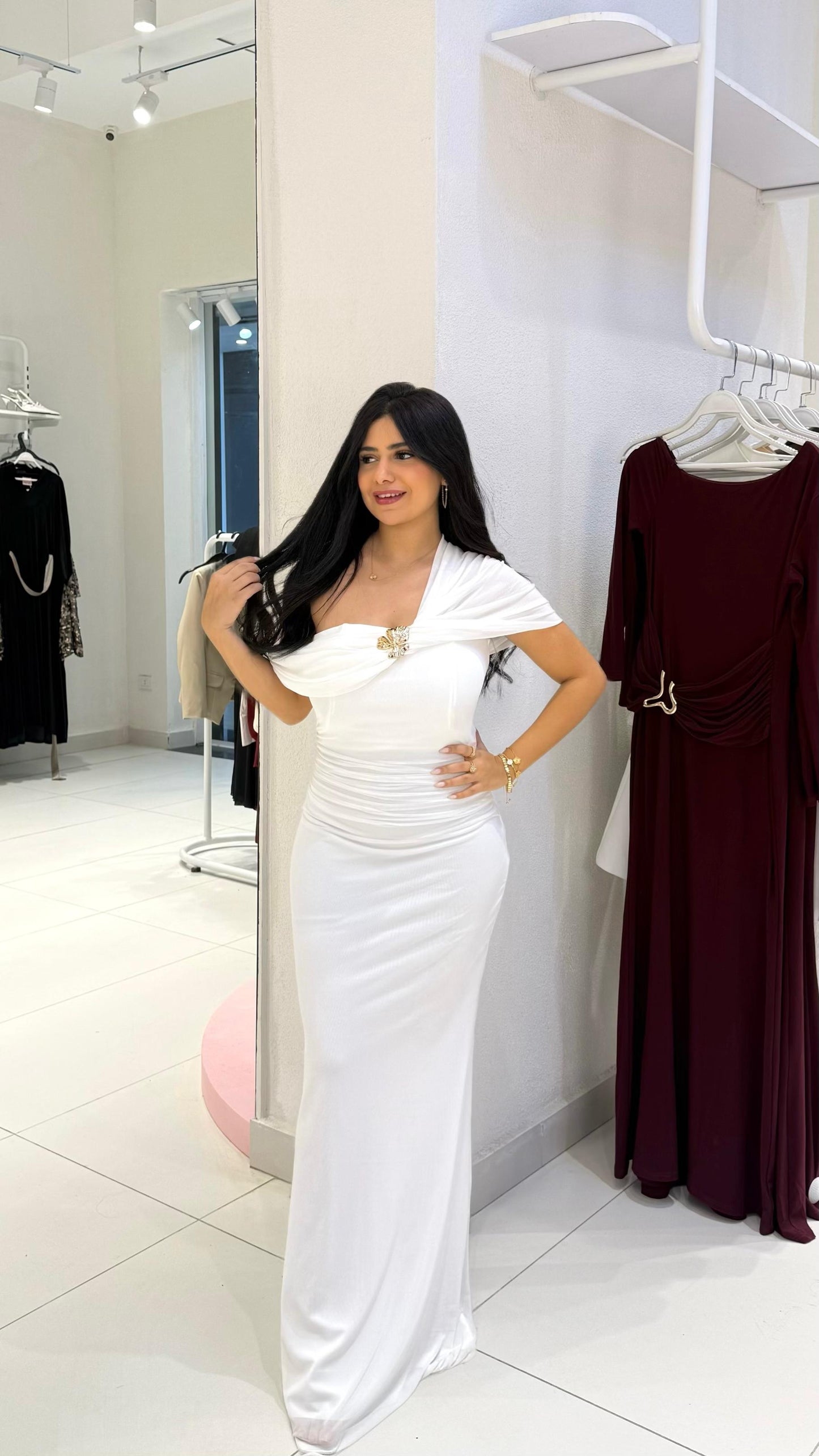Off-shoulder dress with a ruffled tulle design