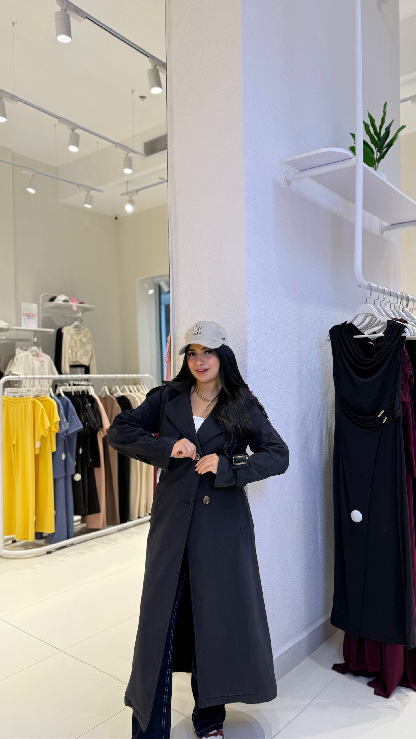 Double-breasted trench coat with a gabardine belt