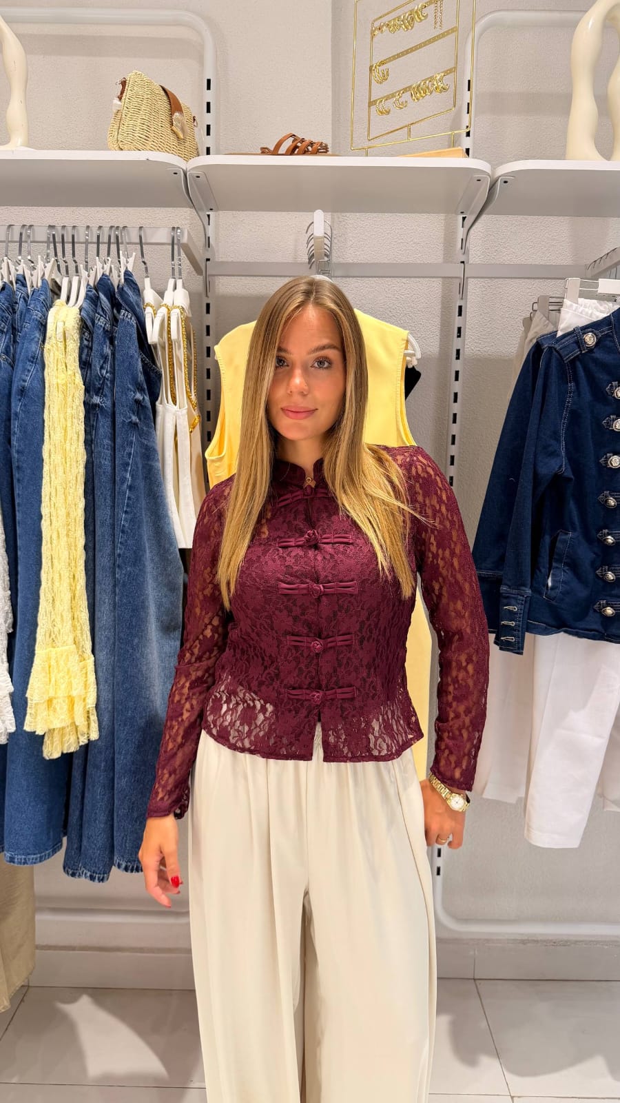 Lace blouse with frog-shaped buttons