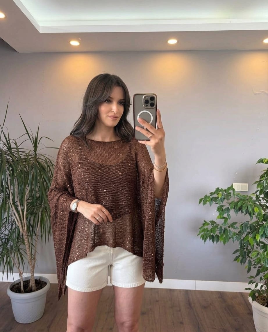 Knitted blouse decorated with sequins