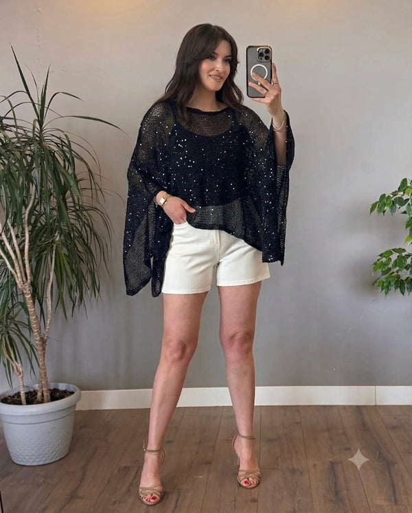Knitted blouse decorated with sequins