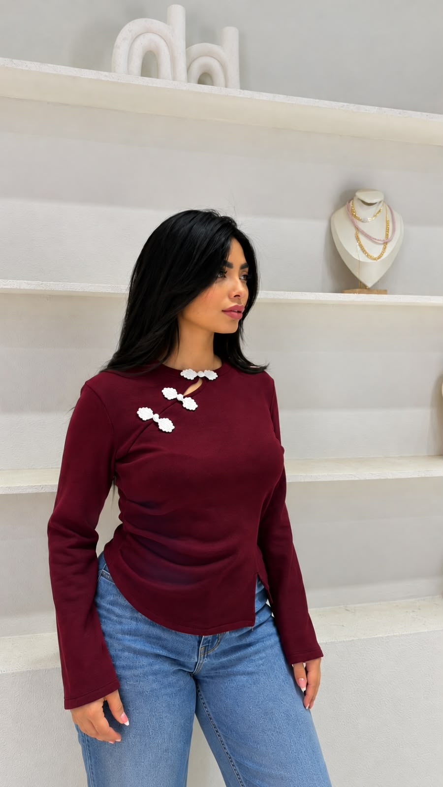Long-sleeved knit top with an asymmetric button closure, view 2