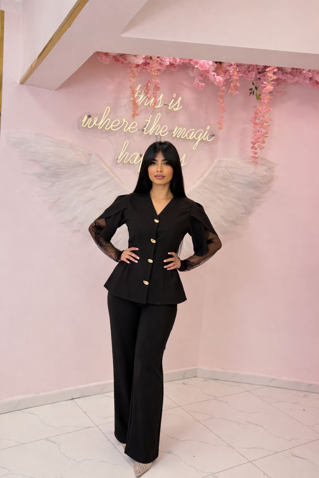 A sculpted peplum blazer set with lace sleeves