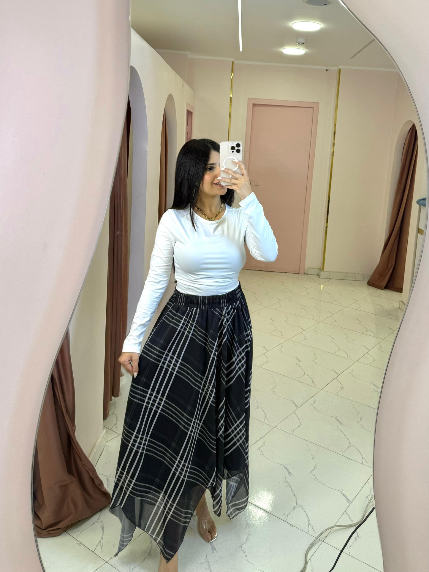 Asymmetrical chiffon skirt with a checkered pattern