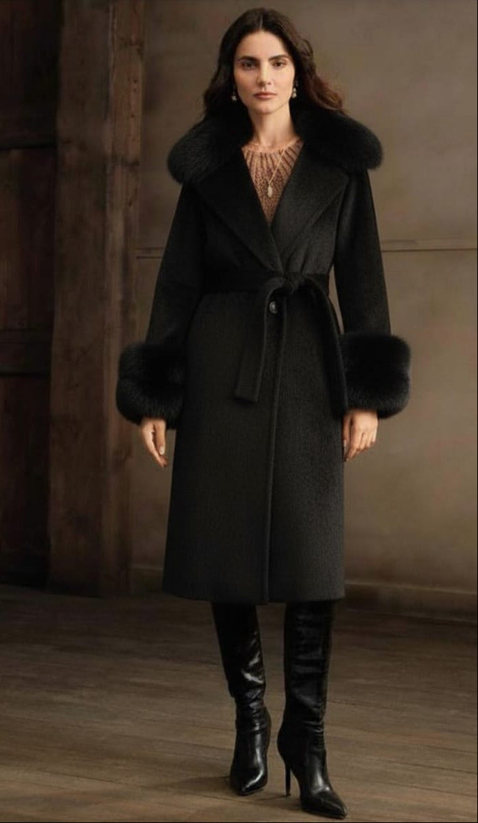 A wool blend coat with a belt, featuring a faux fur collar and cuffs.