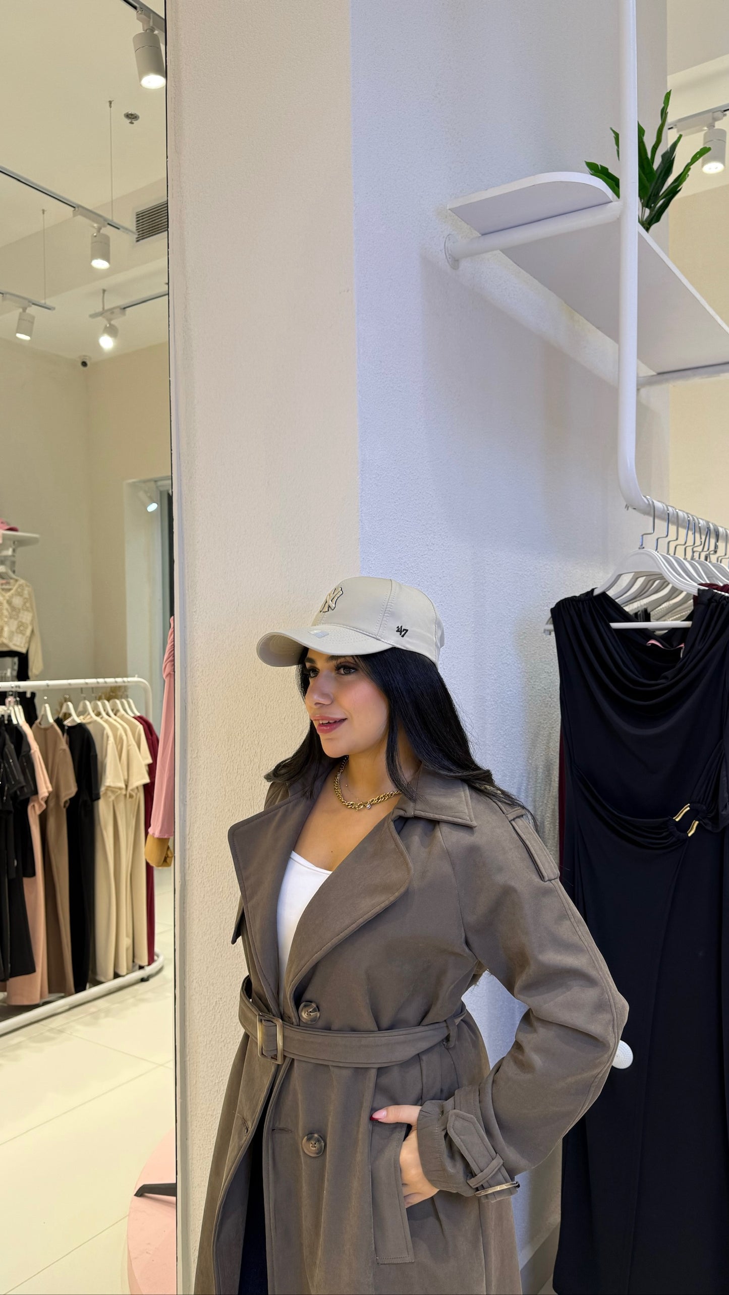 Double-breasted trench coat with a gabardine belt
