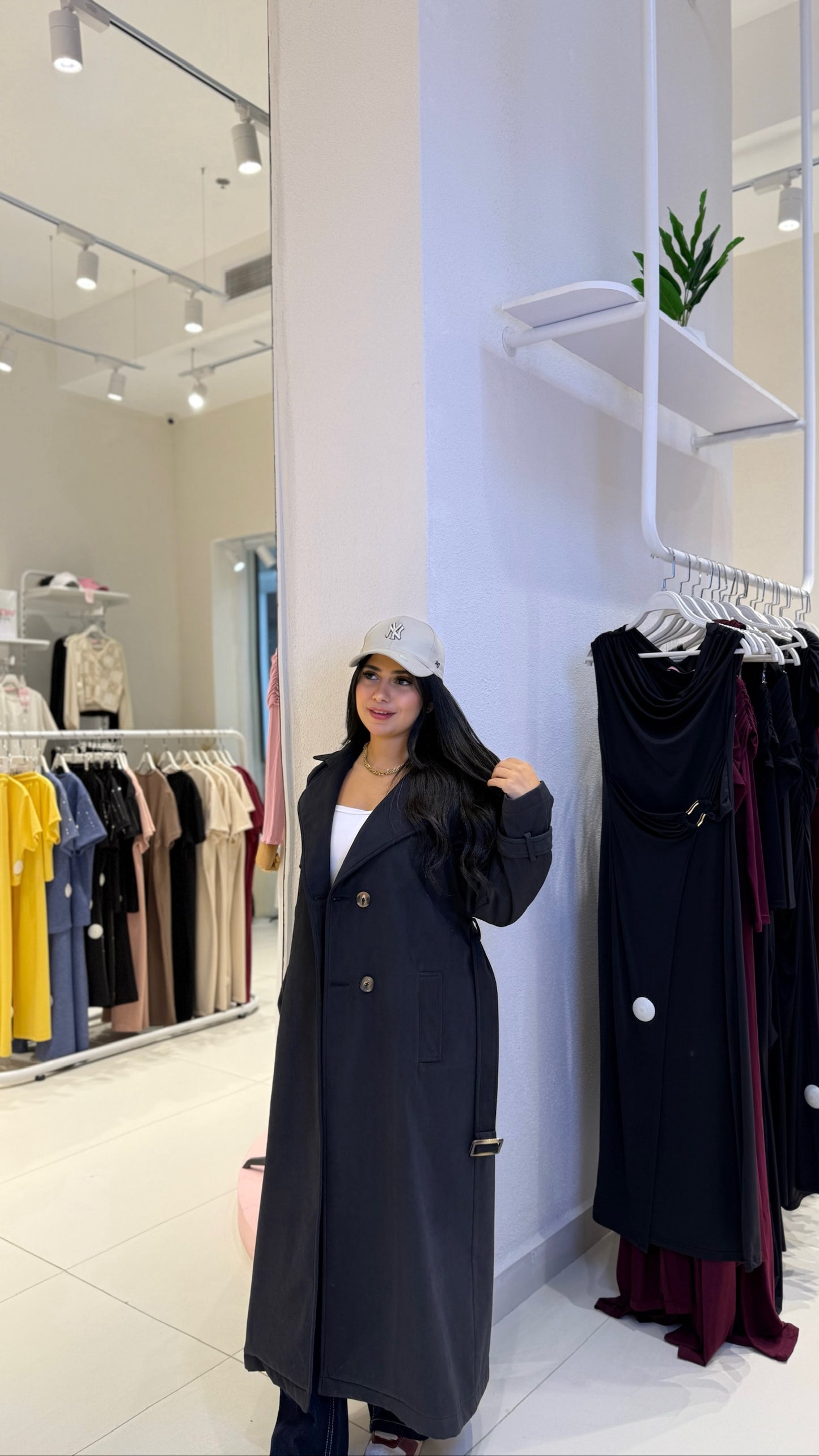 Double-breasted trench coat with a gabardine belt